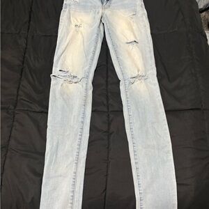 Women's Light Blue Distressed Jeans